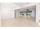 Open floor plan connecting dining, living, and kitchen areas at 12576 Se 97Th Terrace Rd, Summerfield, FL 34491
