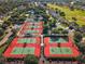 Aerial view of community tennis courts at 12576 Se 97Th Terrace Rd, Summerfield, FL 34491