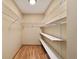 Walk-in closet features wire shelving for ample storage at 9068 Sw 82Nd Ter # A, Ocala, FL 34481