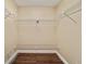 Walk-in closet with installed shelving and lighting at 9068 Sw 82Nd Ter # A, Ocala, FL 34481