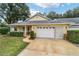 Charming single-story home with a two-car garage and well-manicured front lawn at 9068 Sw 82Nd Ter # A, Ocala, FL 34481