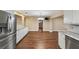 Open kitchen features stainless appliances, granite counters and eat in area at 9068 Sw 82Nd Ter # A, Ocala, FL 34481