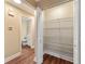 Pantry with wire shelving adjacent to a hallway bathroom at 9068 Sw 82Nd Ter # A, Ocala, FL 34481