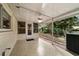 Enclosed patio space with a ceiling fan offering outdoor living at 9068 Sw 82Nd Ter # A, Ocala, FL 34481