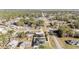 Panoramic view of a cozy neighborhood with well-maintained homes surrounded by trees at 33 Pecan Pass Run, Ocala, FL 34472