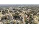 Community aerial view showcases a mix of residential homes and lush greenery at 33 Pecan Pass Run, Ocala, FL 34472