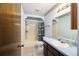 Cozy bathroom with blue walls, vanity, and shower-tub combo at 33 Pecan Pass Run, Ocala, FL 34472