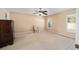 Bedroom features two windows, a ceiling fan and plenty of space for furniture at 33 Pecan Pass Run, Ocala, FL 34472