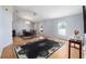 Spacious living room flows into dining room with hardwood floors and ample light at 33 Pecan Pass Run, Ocala, FL 34472