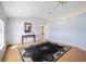 Spacious living room features a ceiling fan, lots of light, and hardwood floors at 33 Pecan Pass Run, Ocala, FL 34472