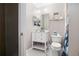 This charming bathroom features a new vanity, mirror, and themed shower curtain at 4535 Se 32Nd Pl, Ocala, FL 34480