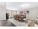 Spacious dining room with a large table and abundant natural light at 4535 Se 32Nd Pl, Ocala, FL 34480