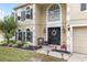 Inviting front entrance with decorative wreaths and seasonal decor enhancing the home's exterior at 4535 Se 32Nd Pl, Ocala, FL 34480