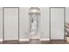 Hallway with an arched entryway and tiled floors at 4535 Se 32Nd Pl, Ocala, FL 34480
