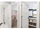 Bright hallway leading to a playroom with ample storage at 4535 Se 32Nd Pl, Ocala, FL 34480