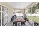 The screened in patio is perfect for entertaining or dining al fresco at 4535 Se 32Nd Pl, Ocala, FL 34480