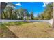 Large backyard with a white privacy fence at 14152 Se 43Rd Ter, Summerfield, FL 34491