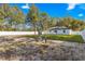 Large backyard with a white privacy fence and well at 14152 Se 43Rd Ter, Summerfield, FL 34491