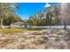 Large backyard with a white privacy fence at 14152 Se 43Rd Ter, Summerfield, FL 34491