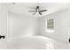 Spacious bedroom featuring large window and marble tile floor at 14152 Se 43Rd Ter, Summerfield, FL 34491