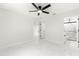 Bright bedroom with ceiling fan and marble flooring at 14152 Se 43Rd Ter, Summerfield, FL 34491