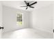 Bright bedroom with large window and marble floors at 14152 Se 43Rd Ter, Summerfield, FL 34491