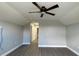 Bedroom featuring a ceiling fan, hard surface floors, and access to other rooms at 17781 Sw 72Nd Street Rd, Dunnellon, FL 34432