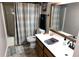 Bright bathroom featuring a bathtub, toilet, and cabinet sink at 727 Ne 130Th Ter, Silver Springs, FL 34488