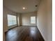 A spacious room featuring hard wood flooring and lots of natural light at 9115 Sw 49Th Ct, Ocala, FL 34476