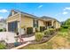 One-story house with a two-car garage and well-manicured landscaping at 9873 Sw 99Th Loop, Ocala, FL 34481