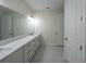 Spacious bathroom with double vanity and large mirror at 13850 Se 42Nd Ave, Summerfield, FL 34491