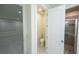 Convenient bathroom with toilet and access to other rooms at 13850 Se 42Nd Ave, Summerfield, FL 34491