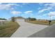 Single-story house with a long driveway at 45 Water Trak, Ocala, FL 34472