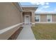 Front entry with walkway leading to the front door at 45 Water Trak, Ocala, FL 34472