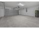 Spacious garage with overhead door and concrete floor at 45 Water Trak, Ocala, FL 34472