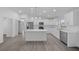 Modern kitchen with white cabinets and stainless steel appliances at 45 Water Trak, Ocala, FL 34472