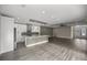 Modern kitchen with white cabinets and quartz countertops at 10250 Sw 82Nd Ct, Ocala, FL 34481