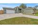 Modern kitchen featuring white cabinets and quartz countertops at 10250 Sw 82Nd Ct, Ocala, FL 34481