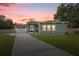 Spacious living room with ample seating and large TV at 10250 Sw 82Nd Ct, Ocala, FL 34481