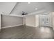 Spacious living room with high ceilings and vinyl plank flooring at 10250 Sw 82Nd Ct, Ocala, FL 34481