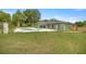 Relaxing kidney shaped pool, surrounded by a spacious patio at 10250 Sw 82Nd Ct, Ocala, FL 34481