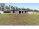 Expansive backyard offers ample space for outdoor activities, providing a private and serene setting at 13234 Sw 113 Ln, Dunnellon, FL 34432
