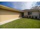 Close up of a charming single-story home with manicured landscaping, and an inviting entryway at 10817 Se 51St Ave, Belleview, FL 34420