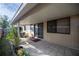 Enclosed patio area with tiled flooring, offering a perfect blend of indoor-outdoor living at 10817 Se 51St Ave, Belleview, FL 34420