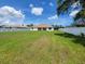Spacious backyard featuring a well-manicured lawn and a white fence at 11610 Sw 59Th Terrace, Ocala, FL 34476