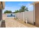 Private patio area featuring brick pavers and decorative landscape at 973 Buster Pl, The Villages, FL 32162