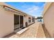 Comfortable patio with awning and stylish brick pavers at 973 Buster Pl, The Villages, FL 32162