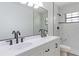 Beautiful bathroom with dual sinks and black hardware at 4360 Se 58Th Pl, Ocala, FL 34480