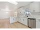 Bright kitchen featuring stainless appliances, quartz counters, and open layout at 4360 Se 58Th Pl, Ocala, FL 34480