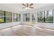 Bright living room with great views and a ceiling fan at 4360 Se 58Th Pl, Ocala, FL 34480